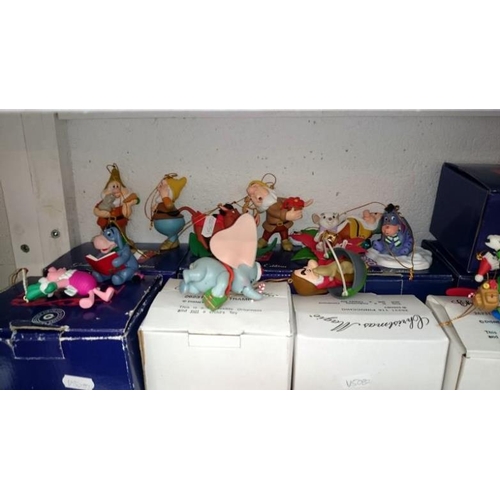 110 - A large collection of Disney Christmas ornaments