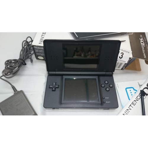 13 - A boxed Nintendo DS lite