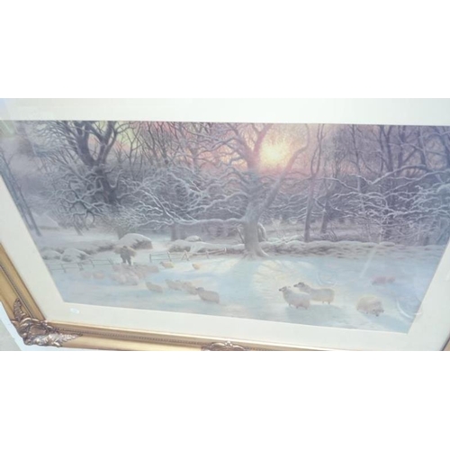 147 - 2 gilt framed and glazed prints of continental river scene and a rural scene in Winter