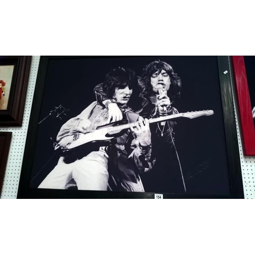 154 - 3 framed & glazed items including Rolling Stones concert photo's by Steve Emberton & framed & glazed... 