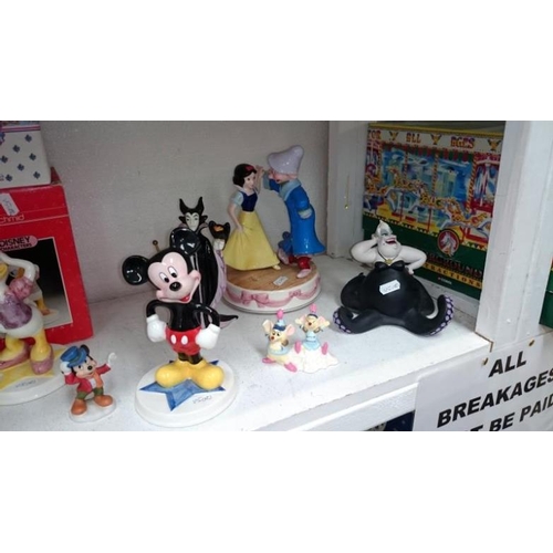 173 - Quantity of Disney items by Scmid inc. music boxes, figures etc