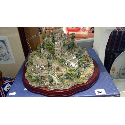 246 - A boxed Lilliput Lane ltd. edition Coniston Crag on wooden plinth No.1905