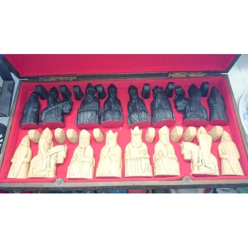 247 - A cased chess set