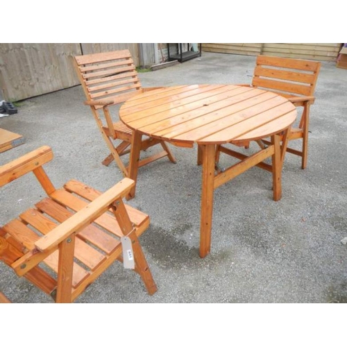 641 - A garden table and 3 chairs