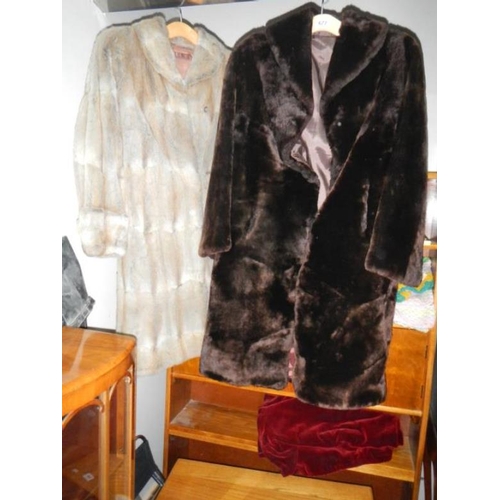 677 - 4 old imitation fur coats etc