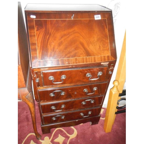 684 - A 4 drawer mahogany desk