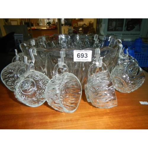 693 - A punch bowl and glasses