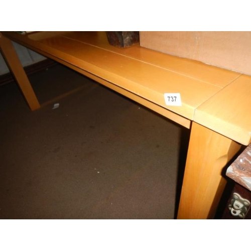 737 - A long pine dining table