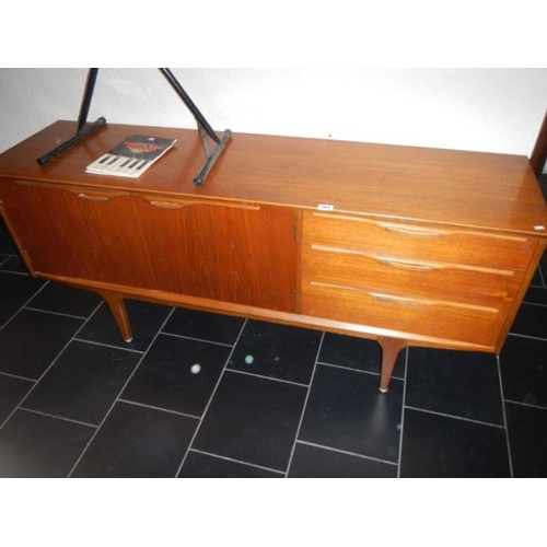 783 - A teak sideboard