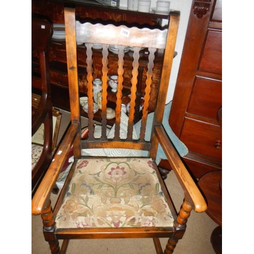 984 - An old Edwardian oak arm chair