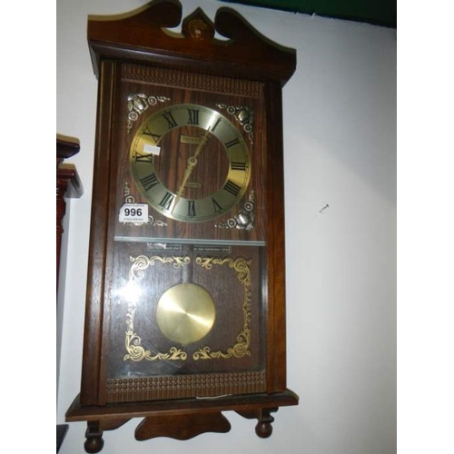 996 - A wall clock and 1 other