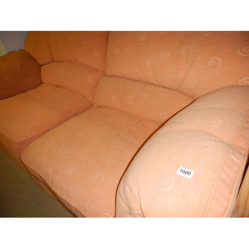 1000 - A 2 seater pink settee