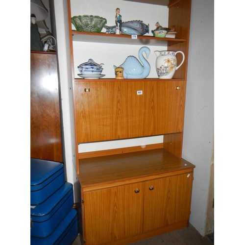 802 - A teak style display cabinet