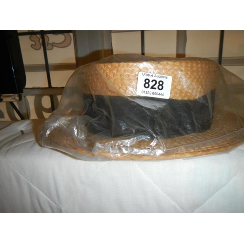 828 - An old boater straw hat