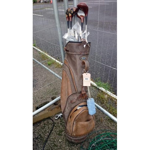 403 - A quantity of golf clubs & golf bag