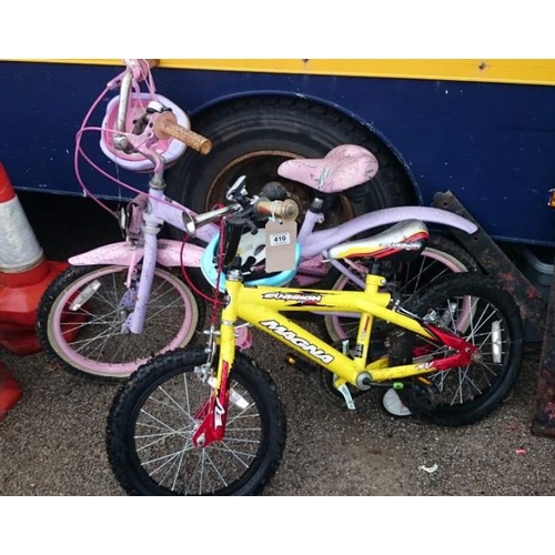 410 - 2 children's bikes & helmets