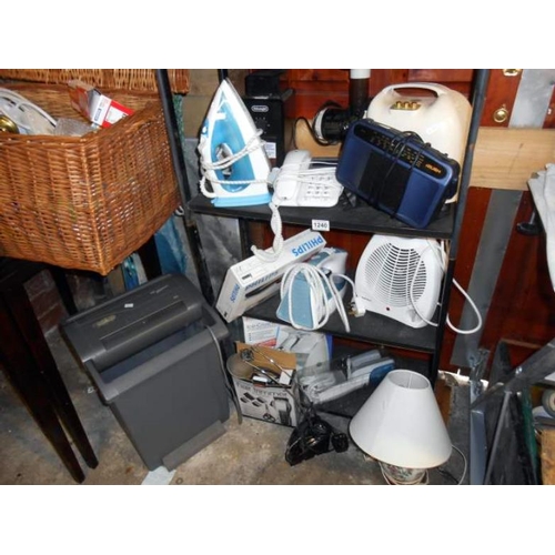 1240 - 3 shelves of miscellaneous including iron, telephone & fan etc.