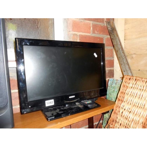 1242 - A Digitom portable flat screen TV