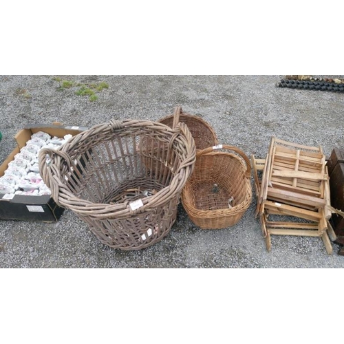 49 - A quantity of wicker baskets etc.