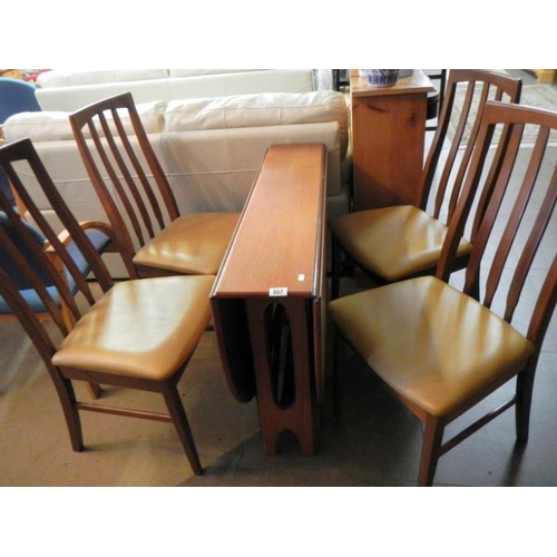 507 - A teak table and 4 chairs