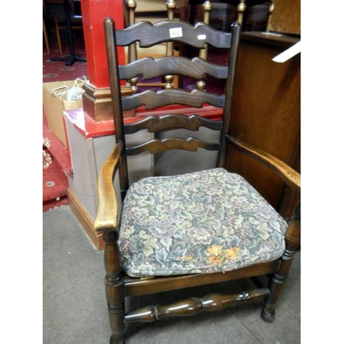 492 - A low old pad foot chair