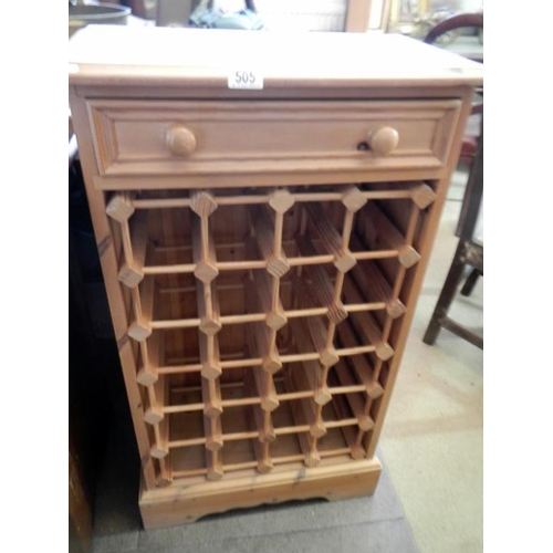 505 - A pine bottle rack wth drawer