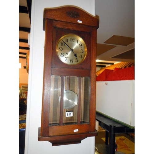 511 - An oak 1920s wall clock