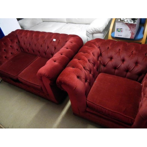 513 - A red deep buttoned 2 seater and 1 seater suite