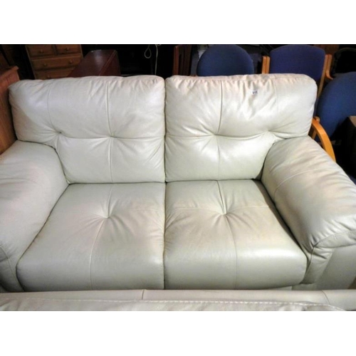 515 - A leather 2 seater settee