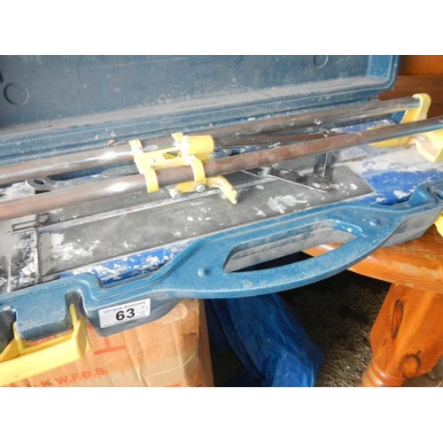 63 - A tile cutter and 2 hole borers