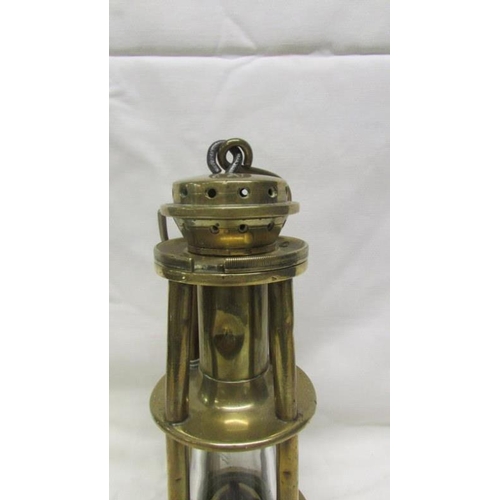 1124 - A rare late 19th century all brass miner's lamp by Davis of Derby