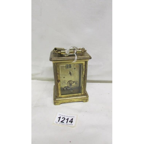 1214 - A brass carriage clock by Dyson & Son, Leeds