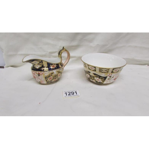 1291 - A Royal Crown Derby sugar bowl and creamer