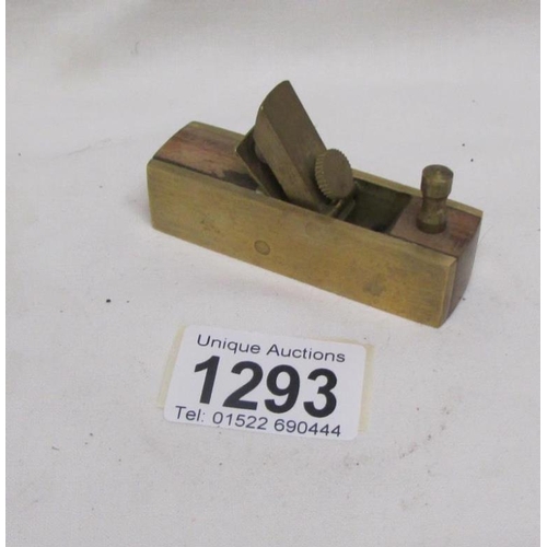 1293 - A vintage miniature brass wood working plane