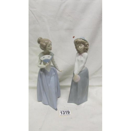 1319 - 2 NAO figurines