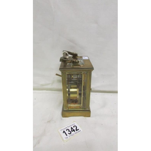 1342 - A Mappin and Webb brass carriage clock