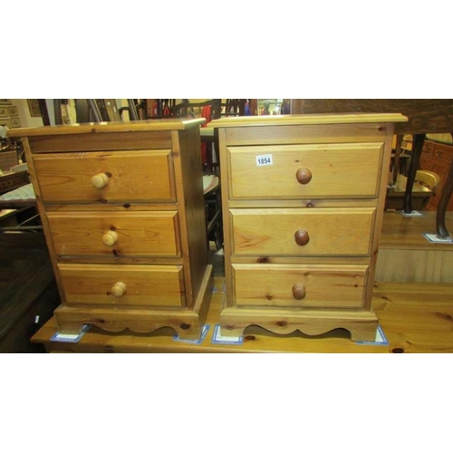 1854 - A pair of pine 3 drawer bedside cabinets