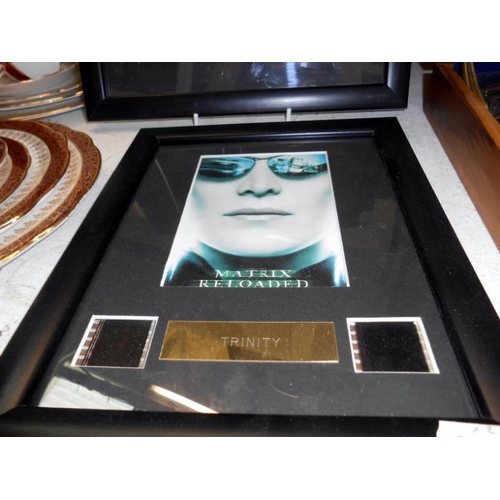 279 - A Matrix reloaded framed film cell & a Matrix revolutions film cell, both with certificates of authe... 