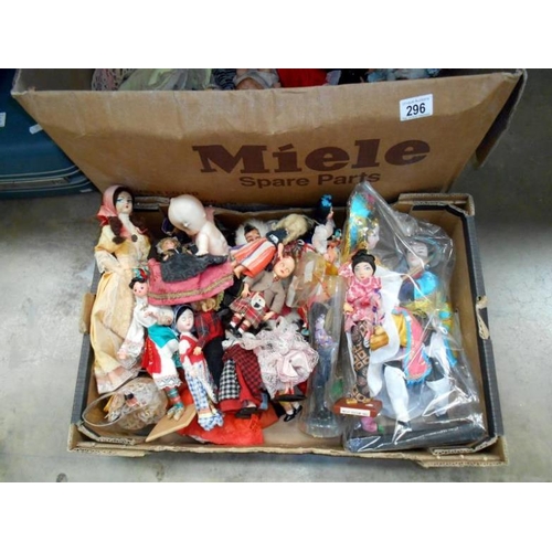 296 - 2 boxes of costume dolls etc.