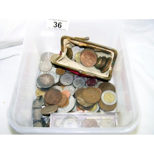 36 - A box of coins etc.