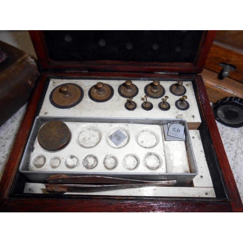 373 - Cased set of laboratories scales with weights