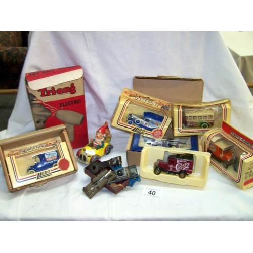 40 - A collection of die-cast toys, Tri-ang toy hairdryer in a box etc.