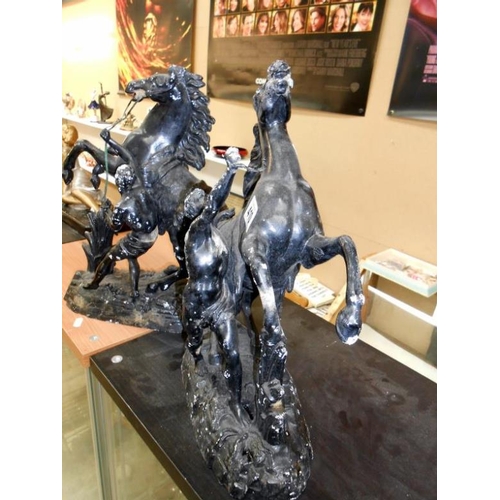 410 - A pair of Marley spelter horses