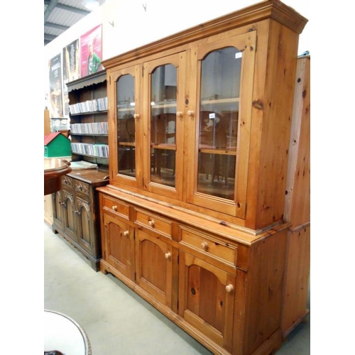 468 - A pine glazed top dresser