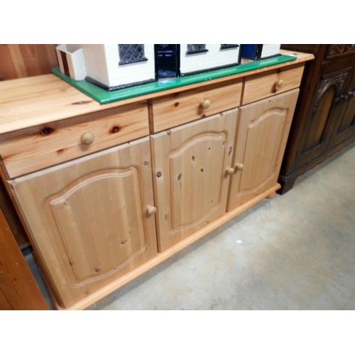 472 - A pine 3 drawer 3 cupboard kitchen unit