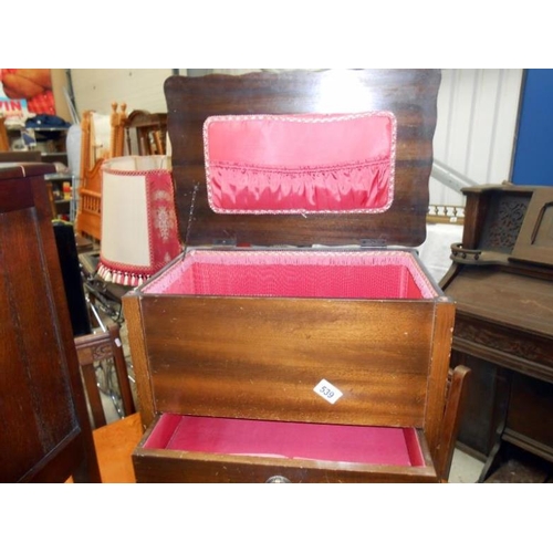 539 - A sewing box on legs