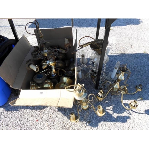 583 - A quantity of chandeliers and oil lamp parts