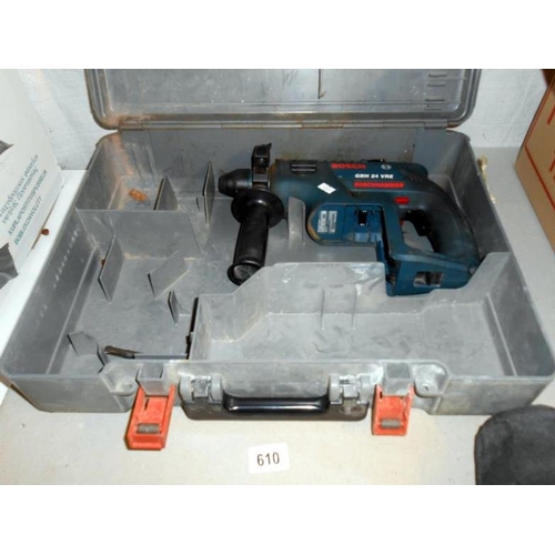 610 - A Bosch hammer drill with charger and battery