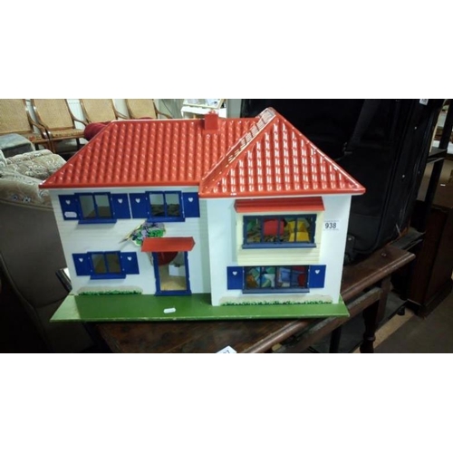 938 - A dolls house and furniture