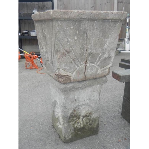 11 - A stone garden planter on stone plinth